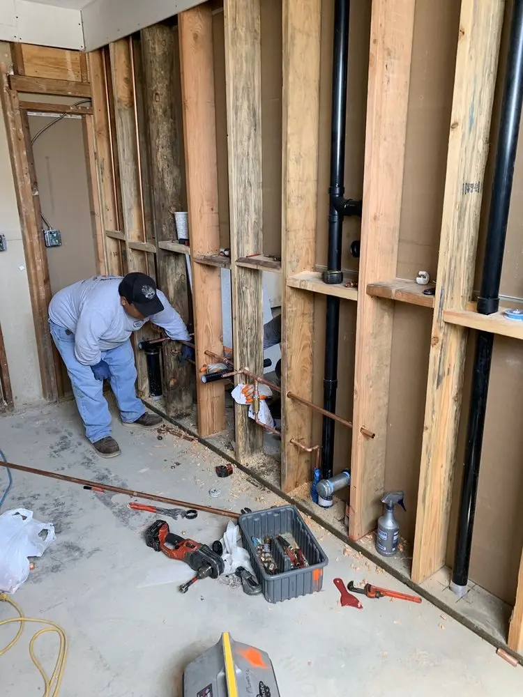 Commercial rough-in plumbing for Water Heater Replacement in Portage Park
